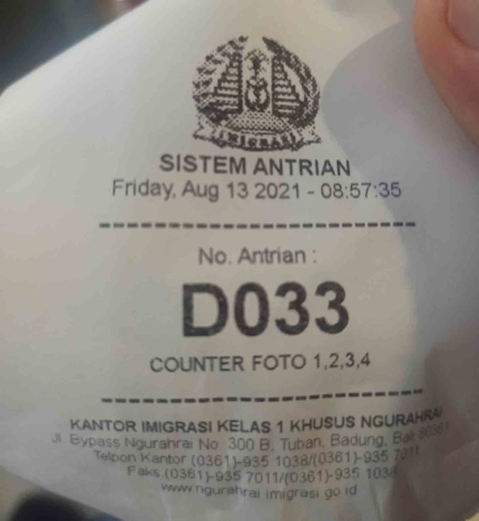 Printed ticket to wait for counter photo. Number D033