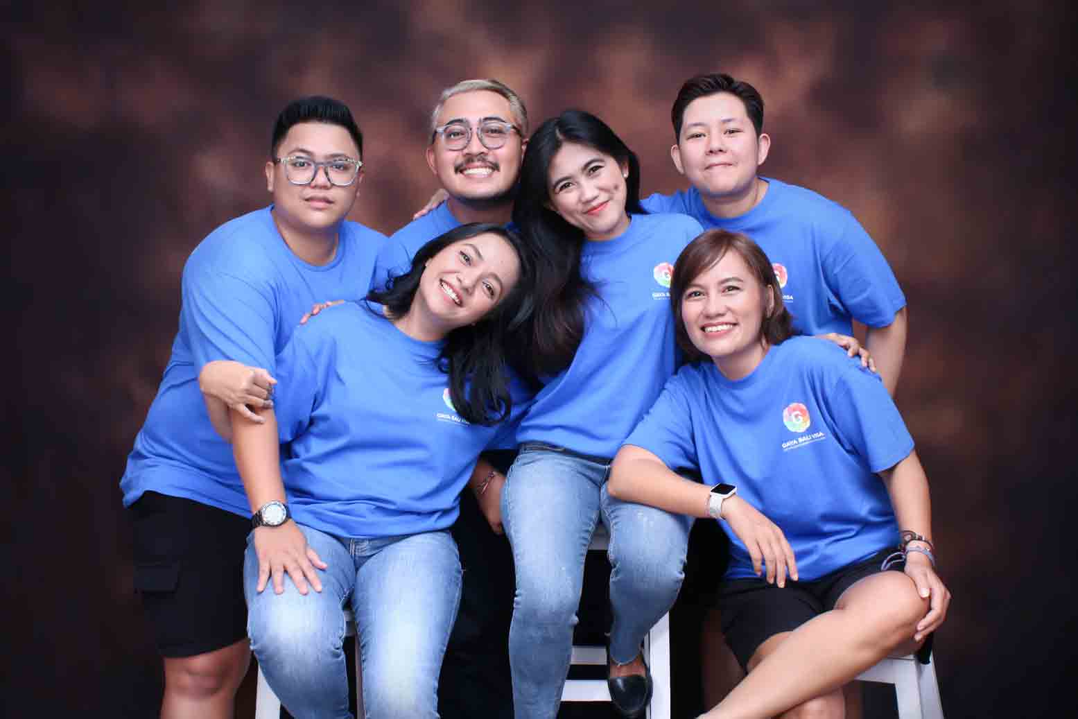 Team of Gaya Bali Visa: 6 person wearing blue t-shirt